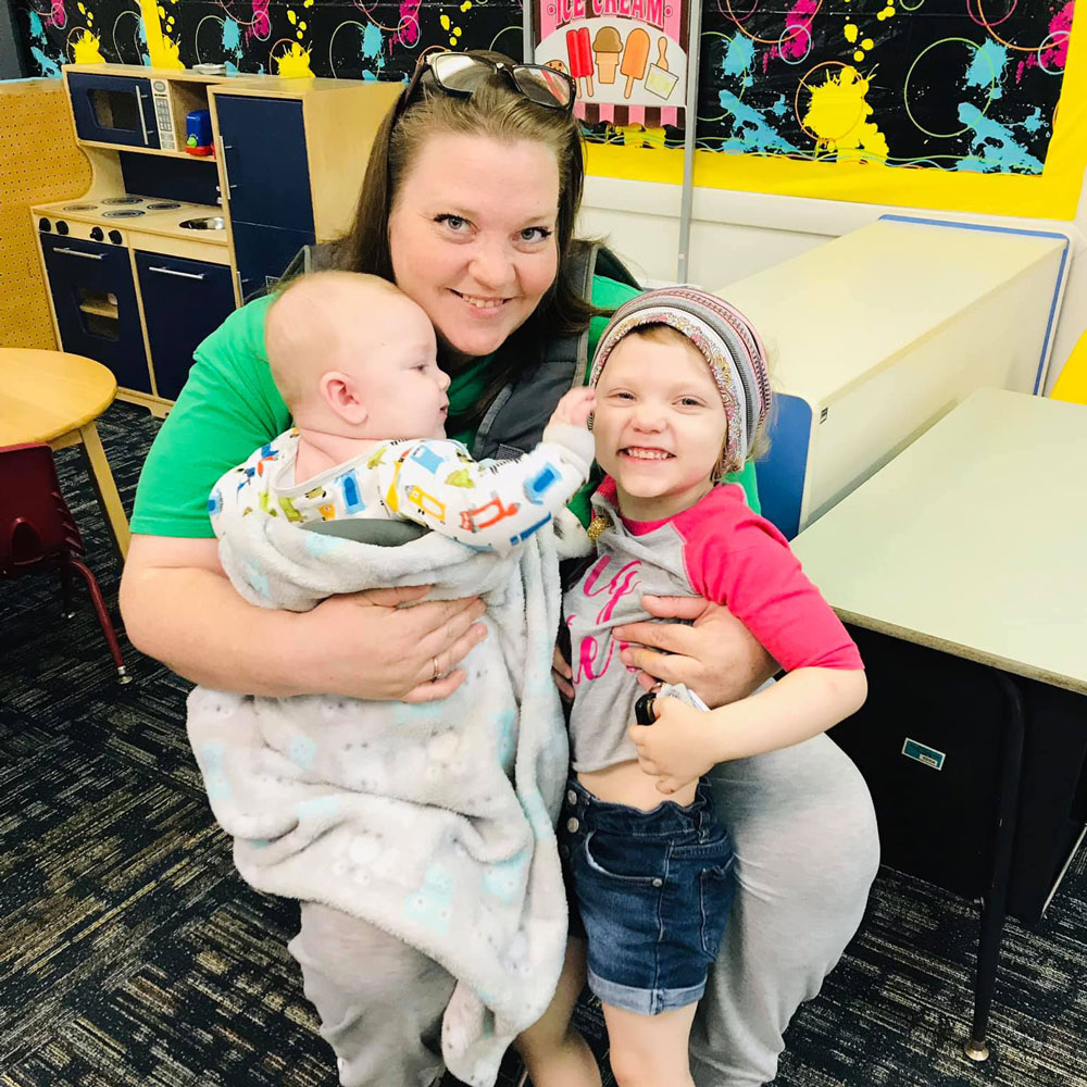 Erica Keller (middle) pictured with Emmett (left) and Shirley, (right) said, "I wanted [my children] to have a head start at an early education." 