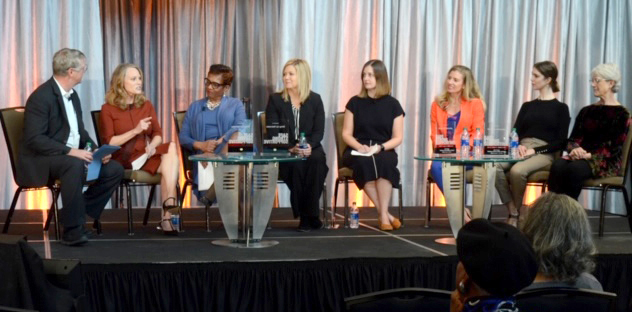 Panelists from Bring Up Nebraska discuss community prevention and well being. l to r: Bill Stanton, First Lady Shore, Dannette R. Smith, Jenny Skala, Emily Kluver, Michelle Paxton, Rebecca Daugherty, and Georgie Scurfield.