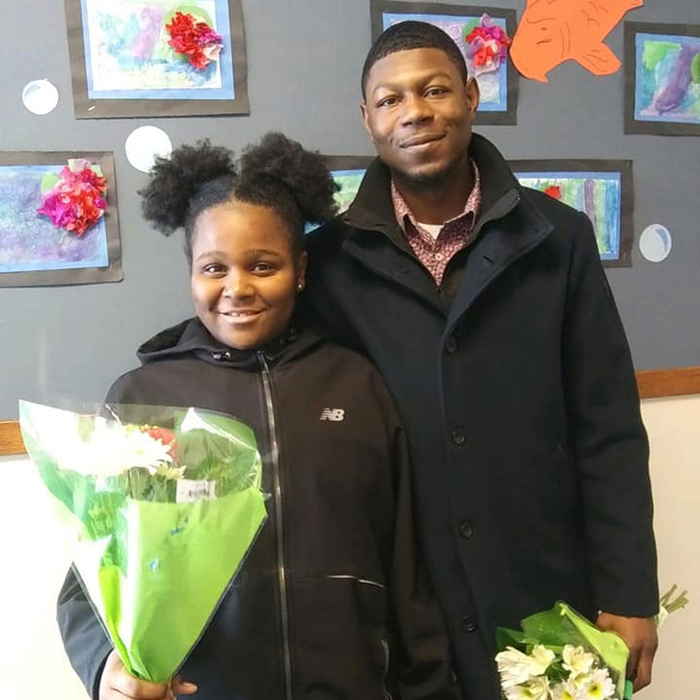 A win-win: shortly after Braxton witnessed the positive influence he had on his afterschool students, he realized that the effect was mutual and far-reaching! Here he is (r) with his cousin. 