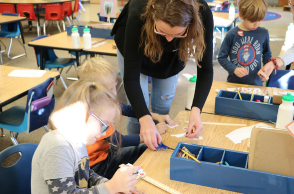 The power of afterschool can't be denied. Here, a UNL Honors student engages kids in afterschool activities that engage the mind and encourage creative problem-solving. 