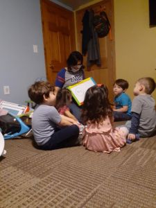 “When [a child] wants to explore, they’re inviting me, saying, ‘Come on, explore with me!’” Marcella (m) engages her children with lively activities and nurturing bonds!