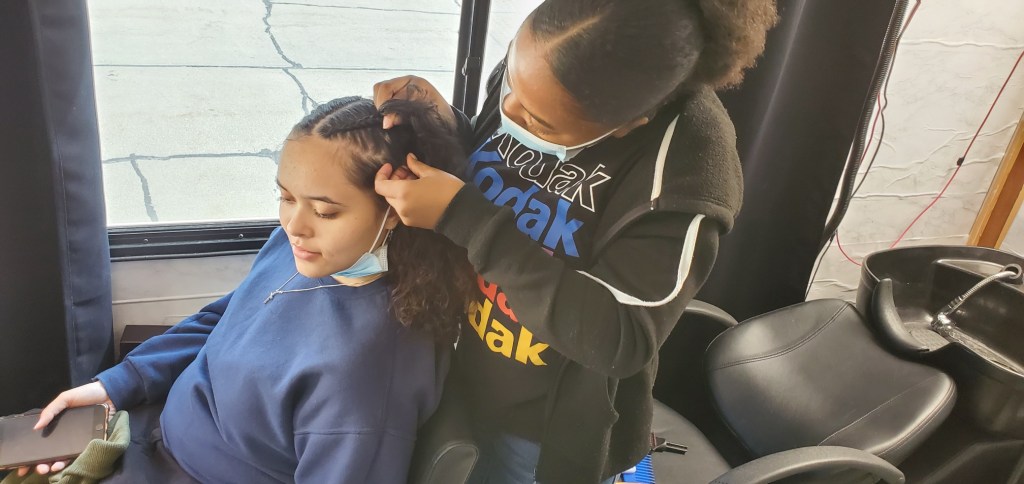 Young people learn how to charge what they're worth for their braiding skills, all the while opening their own businesses, right here at home! 