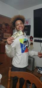 YEF and BSB teach kids how to manage and make money! Bre and Travis' son (above) began his own clothing line, which inspired his parents to encourage other youth to do the same. 