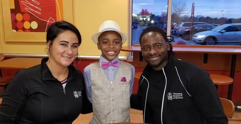 Bre (l) and Travis (r) from Young Entrepreneurs of the Future Omaha (YEF) pose with a promising young entrepreneur. Beyond School Bells works with partners like these to bring life skills and quality learning throughout Nebraska! 