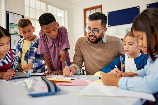 Male teacher in classroom